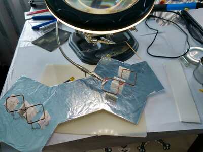 Soldering cables to vibrators